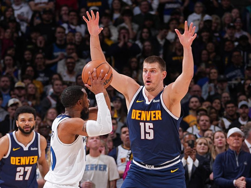 DENVER, CO - APRIL 10:Nikola Jokic #15 of the Denver Nuggets plays defense during the game against the Minnesota Timberwolves  on April 10, 2024 at the Ball Arena in Denver, Colorado. NOTE TO USER: User expressly acknowledges and agrees that, by downloading and/or using this Photograph, user is consenting to the terms and conditions of the Getty Images License Agreement. Mandatory Copyright Notice: Copyright 2024 NBAE (Photo by Bart Young/NBAE via Getty Images)