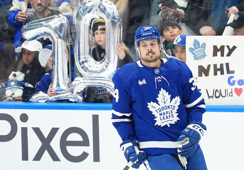 Apr 13, 2024; Toronto, Ontario, CAN; Toronto Maple Leafs center Auston Matthews (34) skates during the warmup before a game against the Detroit Red Wings at Scotiabank Arena. Mandatory Credit: Nick Turchiaro-USA TODAY Sports