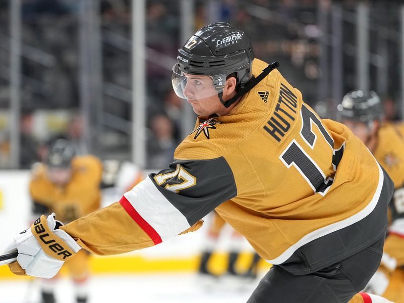 Oct 4, 2022; Las Vegas, Nevada, USA; Vegas Golden Knights defenseman Ben Hutton (17) warms up before facing the Arizona Coyotes in a preseason game at T-Mobile Arena. Mandatory Credit: Stephen R. Sylvanie-USA TODAY Sports