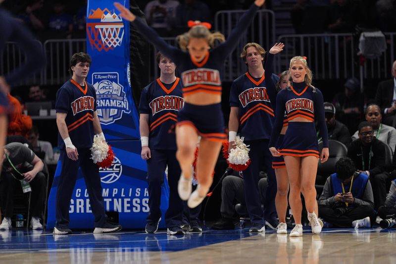 Mar 13, 2026; Charlotte, NC, USA; Virginia Cavaliers cheerleaders perform  during the first half against the Miami (FL) Hurricanes at Spectrum Center. Mandatory Credit: Jim Dedmon-Imagn Images