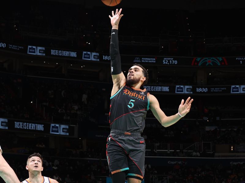 WASHINGTON, DC -? FEBRUARY 4: Tyus Jones #5 of the Washington Wizards shoots the ball during the game against the Phoenix Suns on February 4, 2024 at Capital One Arena in Washington, DC. NOTE TO USER: User expressly acknowledges and agrees that, by downloading and or using this Photograph, user is consenting to the terms and conditions of the Getty Images License Agreement. Mandatory Copyright Notice: Copyright 2024 NBAE (Photo by Stephen Gosling/NBAE via Getty Images)