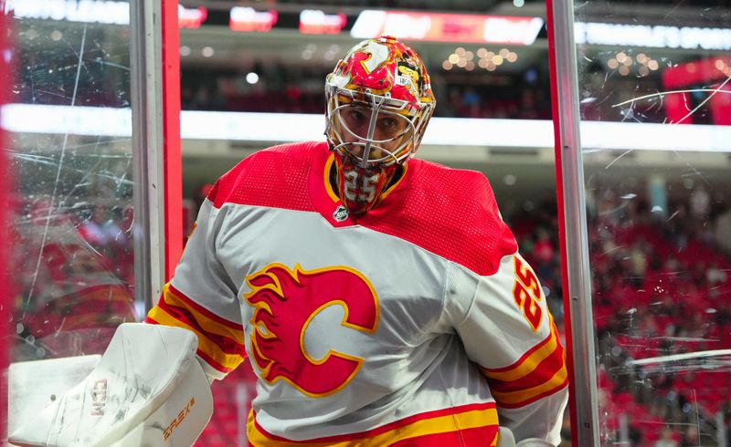 Mar 10, 2024; Raleigh, North Carolina, USA;  Calgary Flames goaltender Jacob Markstrom (25) comes off the ice after the warmups before the game against the Carolina Hurricanes at PNC Arena. Mandatory Credit: James Guillory-USA TODAY Sports