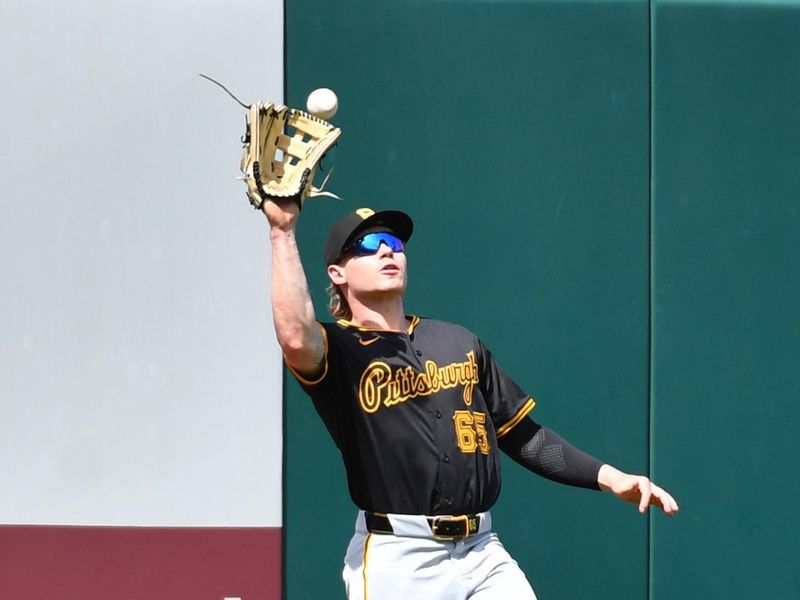 Apr 14, 2024; Philadelphia, Pennsylvania, USA; Pittsburgh Pirates outfielder Jack Suwinski (65) makes a catch during the second inning against the Philadelphia Phillies at Citizens Bank Park. Mandatory Credit: Eric Hartline-USA TODAY Sports