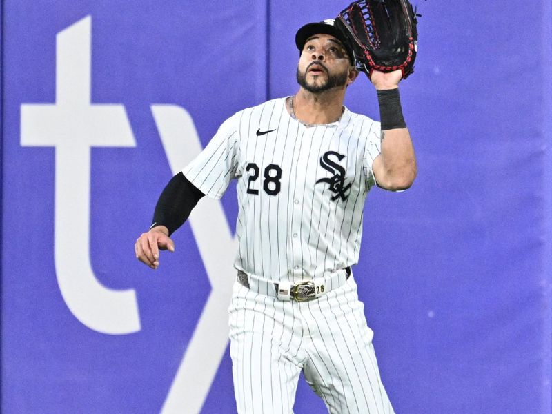 May 28, 2024; Chicago, Illinois, USA;  Chicago White Sox outfielder Tommy Pham (28) catches a fly ball in center field in the fourth inning against the Toronto Blue Jays at Guaranteed Rate Field. Mandatory Credit: Jamie Sabau-USA TODAY Sports