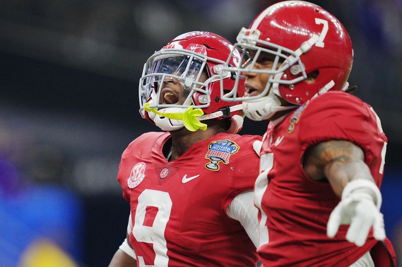 Dec 31, 2022; New Orleans, LA, USA; Alabama Crimson Tide defensive back Jordan Battle (9) celebrates his interception against the Kansas State Wildcats during the first half in the 2022 Sugar Bowl at Caesars Superdome. Mandatory Credit: Andrew Wevers-USA TODAY Sports