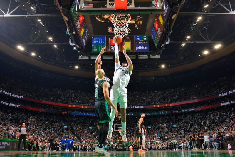 BOSTON, MA - JUNE 9: Daniel Gafford #21 of the Dallas Mavericks drives to the basket during the game against the Boston Celtics during Game 2 of the 2024 NBA Finals on June 9, 2024 at the TD Garden in Boston, Massachusetts. NOTE TO USER: User expressly acknowledges and agrees that, by downloading and or using this photograph, User is consenting to the terms and conditions of the Getty Images License Agreement. Mandatory Copyright Notice: Copyright 2024 NBAE  (Photo by Jesse D. Garrabrant/NBAE via Getty Images)