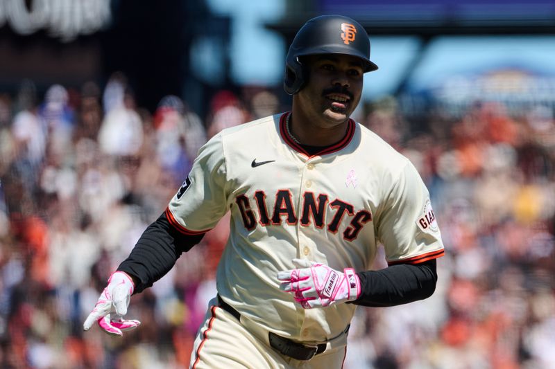 May 12, 2024; San Francisco, California, USA; San Francisco Giants infielder LaMonte Wade Jr. (31) runs the bases after hitting a two run home run against the Cincinnati Reds during the fifth inning at Oracle Park. Mandatory Credit: Robert Edwards-USA TODAY Sports