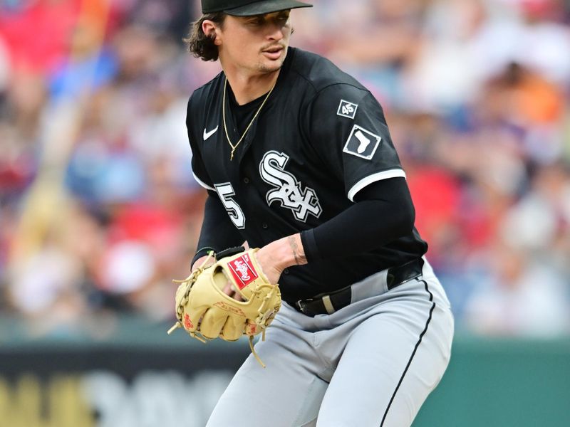 Sep 13, 2025; Cleveland, Ohio, USA; Chicago White Sox starting pitcher Davis Martin (65) throws a pitch  against the Cleveland Guardians during the first inning at Progressive Field. Mandatory Credit: Ken Blaze-Imagn Images