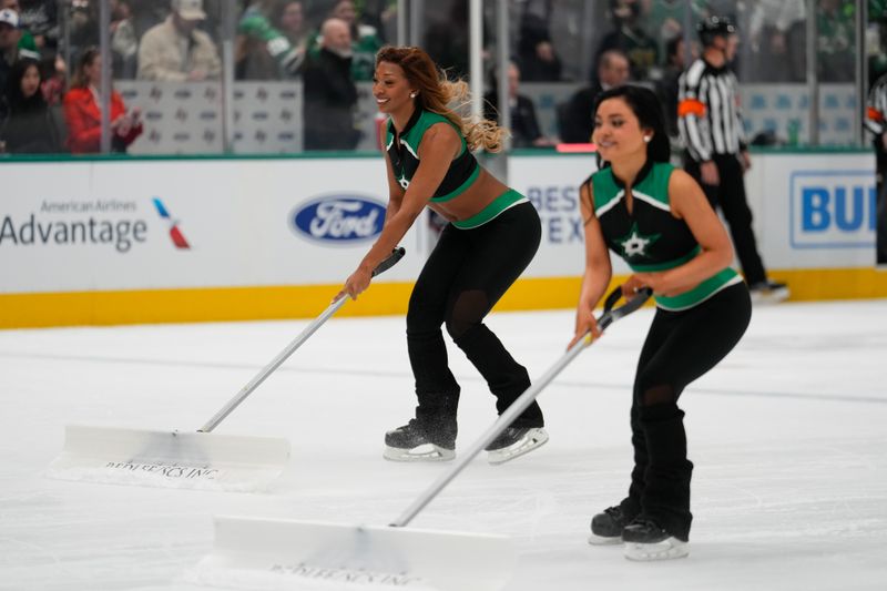 Feb 17, 2024; Dallas, Texas, USA;  Dallas Stars Ice Girls clear the ice during the first period between the Edmonton Oilers and Dallas Stars at American Airlines Center. Mandatory Credit: Chris Jones-USA TODAY Sports