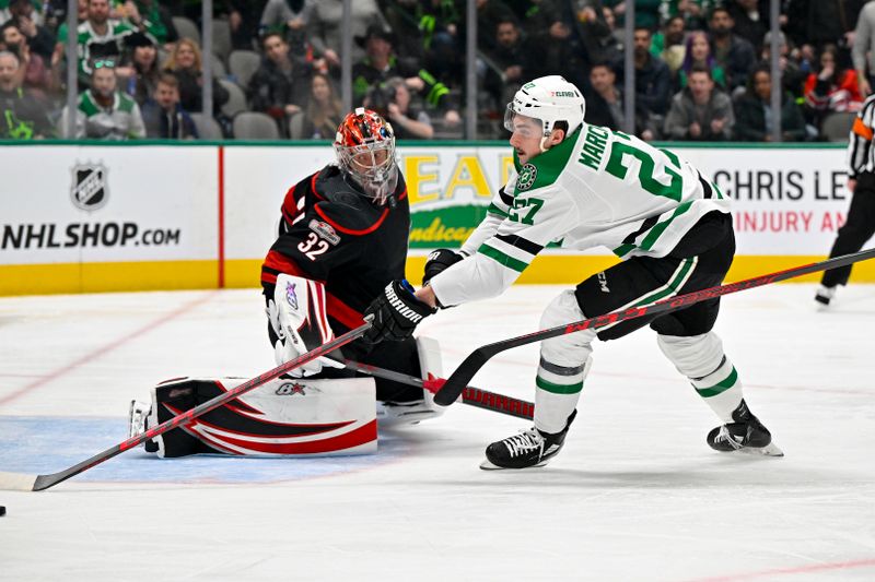 Jan 25, 2023; Dallas, Texas, USA; Carolina Hurricanes goaltender Antti Raanta (32) turns away a breakaway shot by Dallas Stars left wing Mason Marchment (27) during the second period at the American Airlines Center. Mandatory Credit: Jerome Miron-USA TODAY Sports