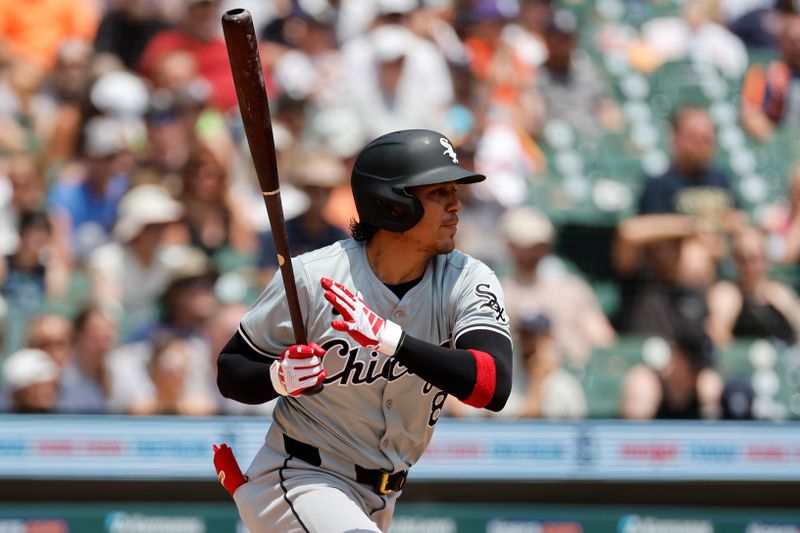 Jun 22, 2024; Detroit, Michigan, USA;  Chicago White Sox second baseman Nicky Lopez (8) hits a single in the third inning against the Detroit Tigersat Comerica Park. Mandatory Credit: Rick Osentoski-USA TODAY Sports