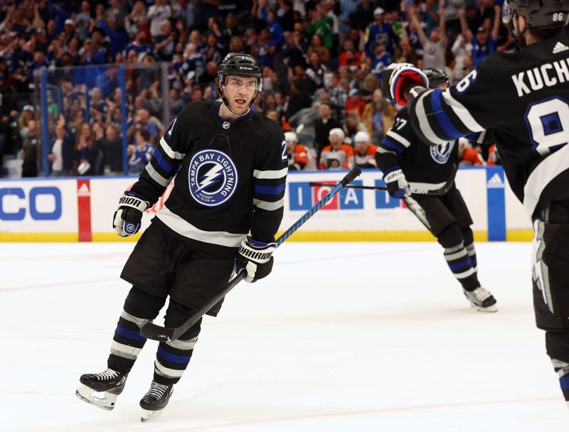 Mar 9, 2024; Tampa, Florida, USA; Tampa Bay Lightning center Brayden Point (21) celebrates after scoring a goal against the Philadelphia Flyers during the first period at Amalie Arena. Mandatory Credit: Kim Klement Neitzel-USA TODAY Sports