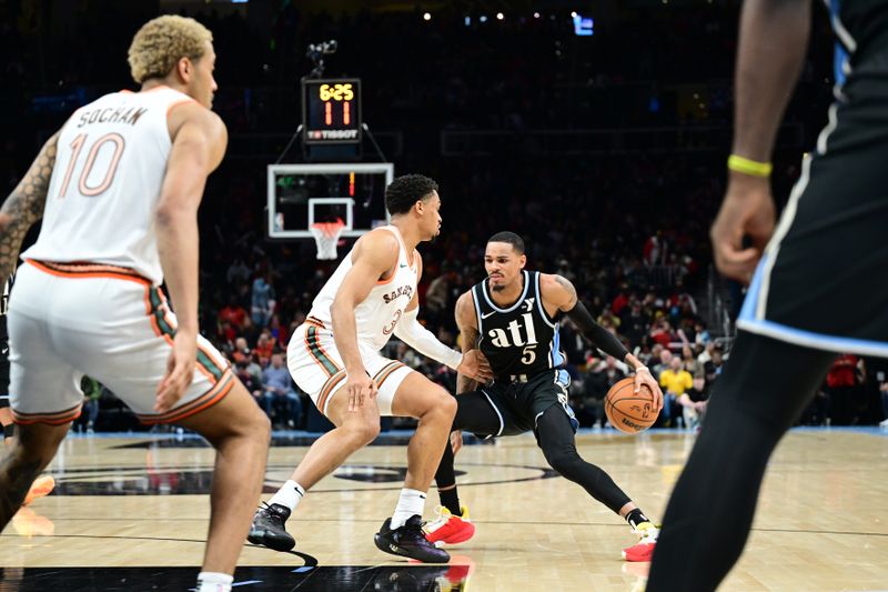 ATLANTA, GA - JANUARY 15: Dejounte Murray #5 of the Atlanta Hawks handles the ball during the game against the San Antonio Spurs on January 15, 2024 at State Farm Arena in Atlanta, Georgia.  NOTE TO USER: User expressly acknowledges and agrees that, by downloading and/or using this Photograph, user is consenting to the terms and conditions of the Getty Images License Agreement. Mandatory Copyright Notice: Copyright 2024 NBAE (Photo by Adam Hagy/NBAE via Getty Images)