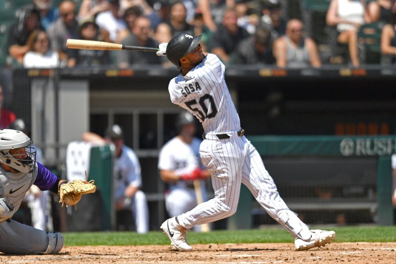 Jun 29, 2024; Chicago, Illinois, USA; Chicago White Sox third base Lenyn Sosa (50) hits a two-run home run during the fifth inning against the Colorado Rockies at Guaranteed Rate Field. Mandatory Credit: Patrick Gorski-USA TODAY Sports