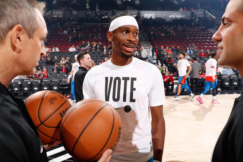 PORTLAND, OR - NOVEMBER 1: Shai Gilgeous-Alexander #2 of the Oklahoma City Thunder smiles before the game against the Portland Trail Blazers on November 1, 2024 at the Moda Center Arena in Portland, Oregon. NOTE TO USER: User expressly acknowledges and agrees that, by downloading and or using this photograph, user is consenting to the terms and conditions of the Getty Images License Agreement. Mandatory Copyright Notice: Copyright 2024 NBAE (Photo by Cameron Browne/NBAE via Getty Images)