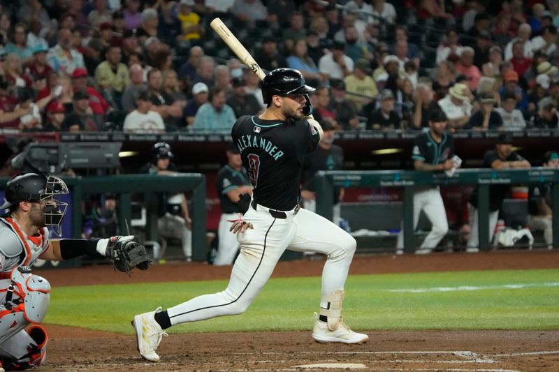 Jun 5, 2024; Phoenix, Arizona, USA; Arizona Diamondbacks shortstop Blaze Alexander (9) hits a single against the San Francisco Giants in the fourth inning at Chase Field. Mandatory Credit: Rick Scuteri-USA TODAY Sports