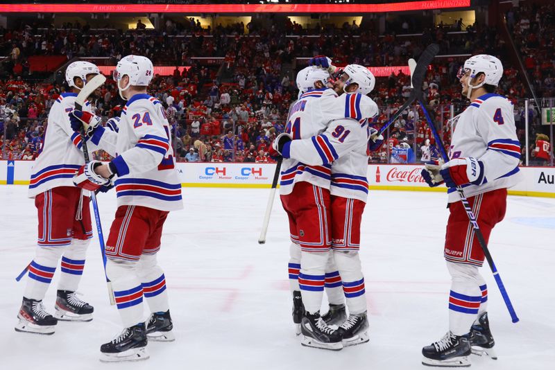 May 26, 2024; Sunrise, Florida, USA; New York Rangers center Alex Wennberg (91) hugs center Barclay Goodrow (21) after scoring the game-winning goal in overtime against the Florida Panthers in game three of the Eastern Conference Final of the 2024 Stanley Cup Playoffs at Amerant Bank Arena. Mandatory Credit: Sam Navarro-USA TODAY Sports