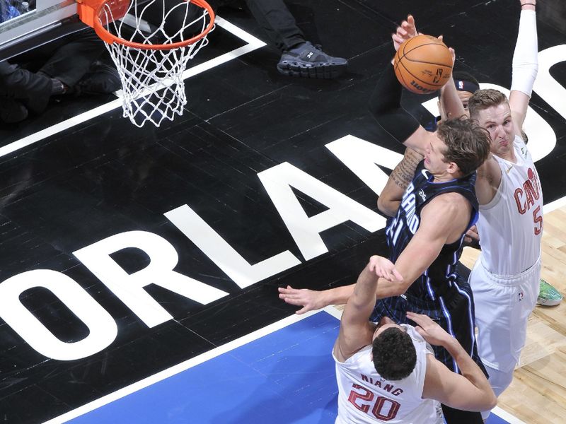 ORLANDO, FL - JANUARY 22: Moritz Wagner #21 of the Orlando Magic drives to the basket during the game against the Cleveland Cavaliers on January 22, 2024 at Kia Center in Orlando, Florida. NOTE TO USER: User expressly acknowledges and agrees that, by downloading and or using this photograph, User is consenting to the terms and conditions of the Getty Images License Agreement. Mandatory Copyright Notice: Copyright 2024 NBAE (Photo by Fernando Medina/NBAE via Getty Images)