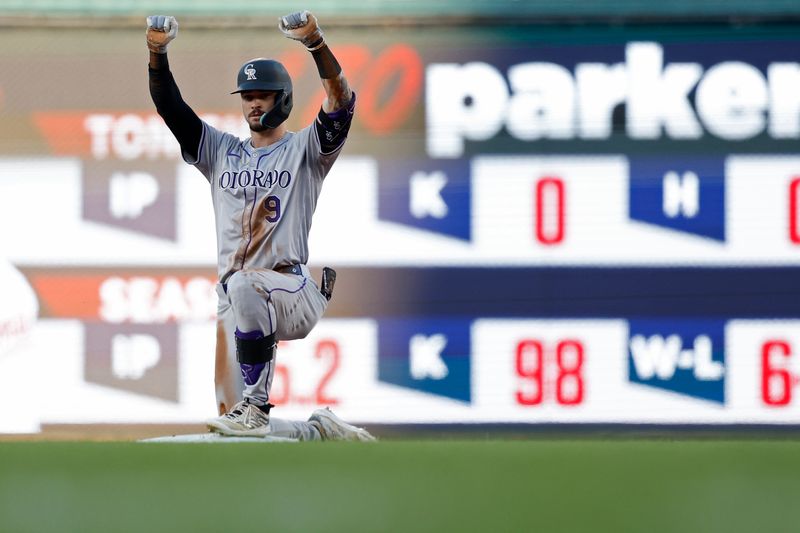 Aug 21, 2024; Washington, District of Columbia, USA; Colorado Rockies outfielder Brenton Doyle (9) celebrates towards his dugout after hitting a double against the Washington Nationals during the first inning at Nationals Park. Mandatory Credit: Geoff Burke-USA TODAY Sports