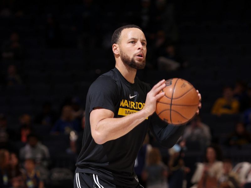 MEMPHIS, TN - MARCH 18: Stephen Curry #30 of the Golden State Warriors warms up before the game against the Memphis Grizzlies on March 18, 2023 at FedExForum in Memphis, Tennessee. NOTE TO USER: User expressly acknowledges and agrees that, by downloading and or using this photograph, User is consenting to the terms and conditions of the Getty Images License Agreement. Mandatory Copyright Notice: Copyright 2023 NBAE (Photo by Joe Murphy/NBAE via Getty Images)