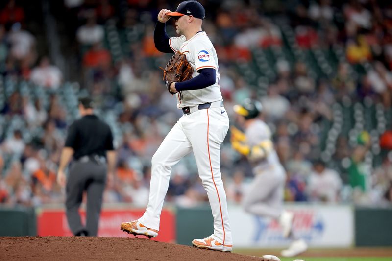 Sep 12, 2024; Houston, Texas, USA; Houston Astros pitcher Ryan Pressly (55) reacts after Oakland Athletics designated hitter Brent Rooker (25) hits a home run to left field during the eighth inning at Minute Maid Park. Mandatory Credit: Erik Williams-Imagn Images