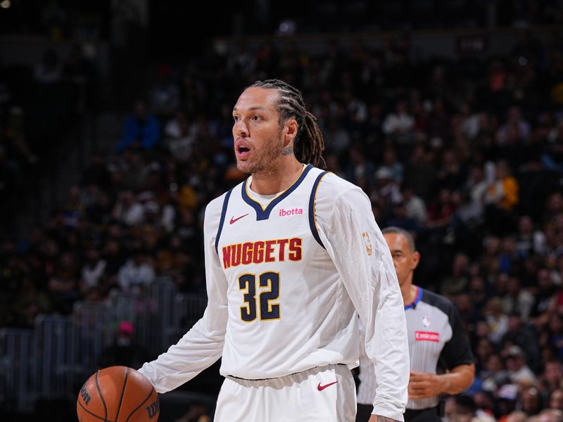 DENVER, CO - OCTOBER 13: Aaron Gordon #32 of the Denver Nuggets dribbles the ball during the game against the Phoenix Suns on October 13, 2024 at Ball Arena in Denver, Colorado. NOTE TO USER: User expressly acknowledges and agrees that, by downloading and/or using this Photograph, user is consenting to the terms and conditions of the Getty Images License Agreement. Mandatory Copyright Notice: Copyright 2024 NBAE (Photo by Garrett Ellwood/NBAE via Getty Images)