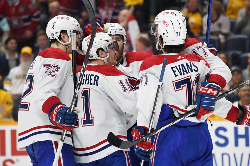 Mar 5, 2024; Nashville, Tennessee, USA; Montreal Canadiens right wing Brendan Gallagher (11) celebrates with teammates after a goal during the second period against the Nashville Predators at Bridgestone Arena. Mandatory Credit: Christopher Hanewinckel-USA TODAY Sports