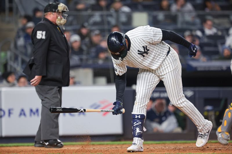 Apr 25, 2024; Bronx, New York, USA; New York Yankees right fielder Juan Soto (22) reacts after striking out during the ninth inning against the Oakland Athletics at Yankee Stadium. Mandatory Credit: Vincent Carchietta-USA TODAY Sports