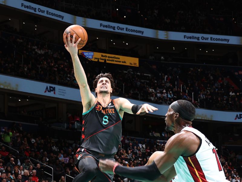 WASHINGTON, DC -?February 2: Deni Avdija #8 of the Washington Wizards drives to the basket during the game against the Miami Heat on February 2, 2024 at Capital One Arena in Washington, DC. NOTE TO USER: User expressly acknowledges and agrees that, by downloading and or using this Photograph, user is consenting to the terms and conditions of the Getty Images License Agreement. Mandatory Copyright Notice: Copyright 2024 NBAE (Photo by Stephen Gosling/NBAE via Getty Images)