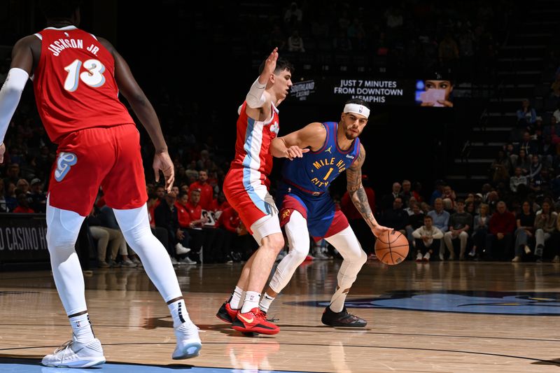 MEMPHIS, TN - NOVEMBER 17: Michael Porter Jr. #1 of the Denver Nuggets dribbles the ball during the game against the Memphis Grizzlies during a regular season game on November 17, 2024 at FedExForum in Memphis, Tennessee. NOTE TO USER: User expressly acknowledges and agrees that, by downloading and or using this photograph, User is consenting to the terms and conditions of the Getty Images License Agreement. Mandatory Copyright Notice: Copyright 2024 NBAE (Photo by Grant Burke/NBAE via Getty Images)