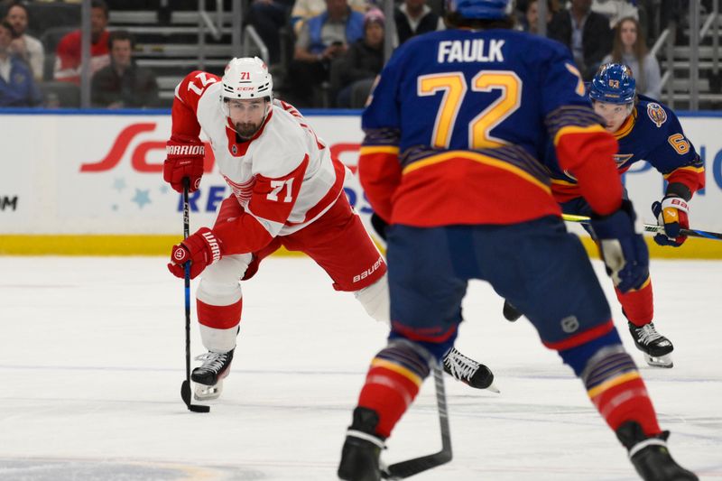 Apr 1, 2025; St. Louis, Missouri, USA; Detroit Red Wings center Dylan Larkin (71) skates against the St. Louis Blues during the first period at Enterprise Center. Mandatory Credit: Jeff Le-Imagn Images