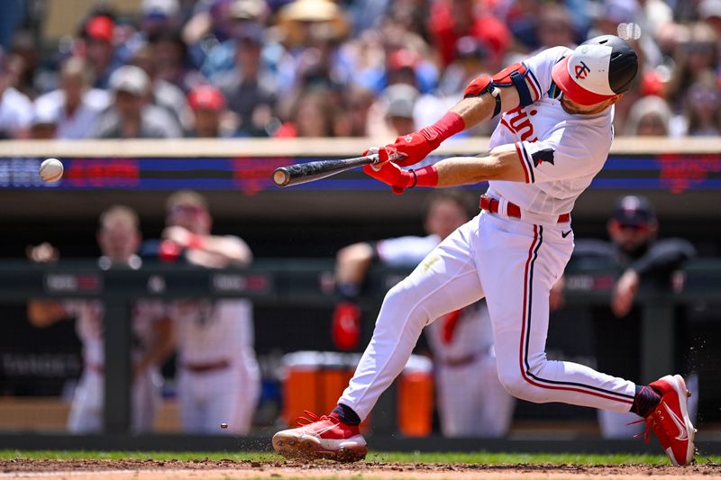 Jul 8, 2023; Minneapolis, Minnesota, USA;  Minnesota Twins infielder Edouard Julien (47) hits a single against the Baltimore Orioles during the third inning at Target Field. Mandatory Credit: Nick Wosika-USA TODAY Sports