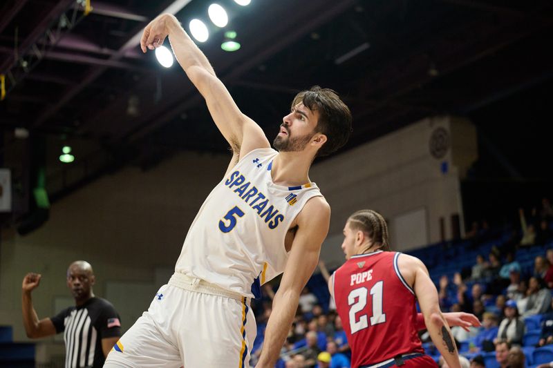 Feb 6, 2024; San Jose, California, USA; San Jose State Spartans forward Tibet Gorener (5) watches a three-point shot attempt against the Fresno State Bulldogs during the second half at Provident Credit Union Event Center. Mandatory Credit: Robert Edwards-USA TODAY Sports
