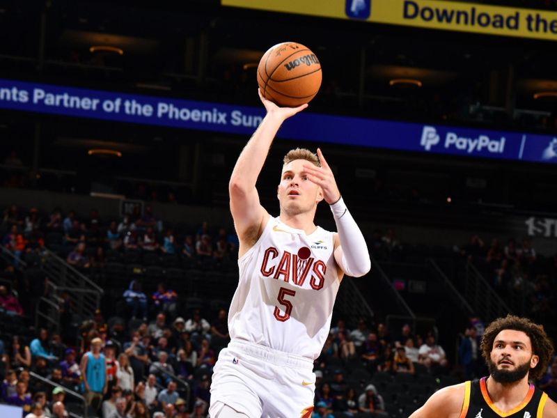 PHOENIX, AZ - APRIL 3:  Sam Merrill #5 of the Cleveland Cavaliers goes to the basket during the game on April 3, 2024 at Footprint Center in Phoenix, Arizona. NOTE TO USER: User expressly acknowledges and agrees that, by downloading and or using this photograph, user is consenting to the terms and conditions of the Getty Images License Agreement. Mandatory Copyright Notice: Copyright 2024 NBAE (Photo by Barry Gossage/NBAE via Getty Images)