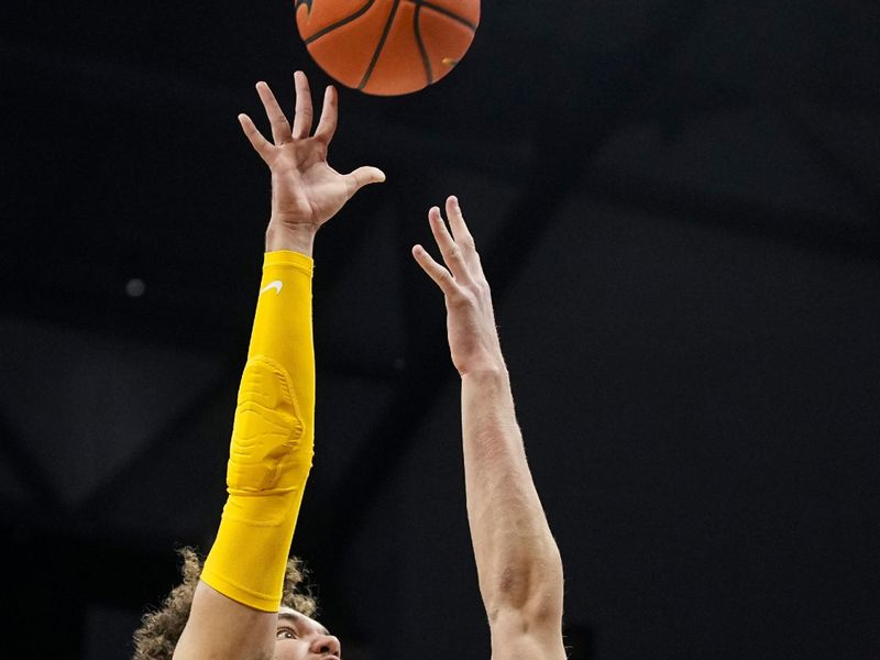 Jan 20, 2024; Columbia, Missouri, USA; Missouri Tigers forward Noah Carter (35) shoots against Florida Gators forward Thomas Haugh (10) during the first half at Mizzou Arena. Mandatory Credit: Jay Biggerstaff-USA TODAY Sports