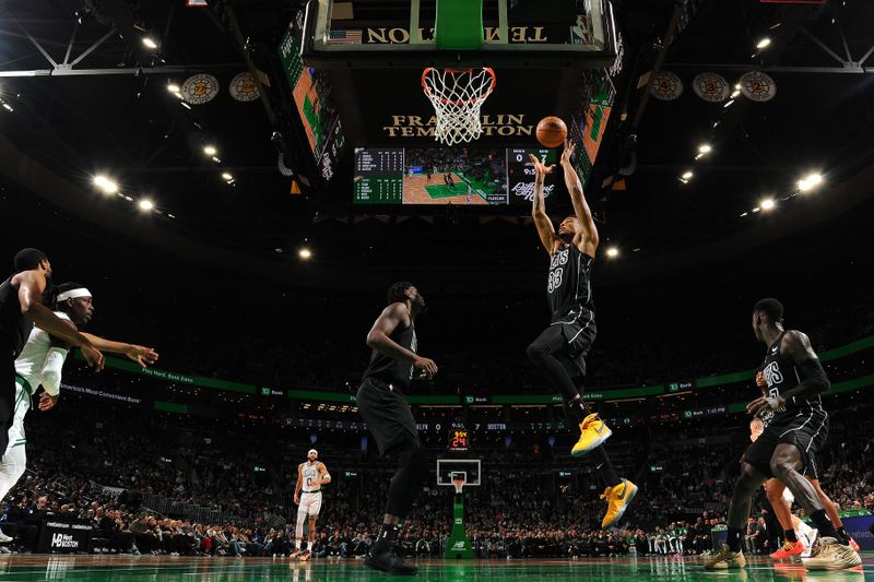 BOSTON, MA - FEBRUARY 14: Nicolas Claxton #33 of the Brooklyn Nets grabs a rebound during the game against the Boston Celtics on February 14, 2024 at the TD Garden in Boston, Massachusetts. NOTE TO USER: User expressly acknowledges and agrees that, by downloading and or using this photograph, User is consenting to the terms and conditions of the Getty Images License Agreement. Mandatory Copyright Notice: Copyright 2024 NBAE  (Photo by Brian Babineau/NBAE via Getty Images)