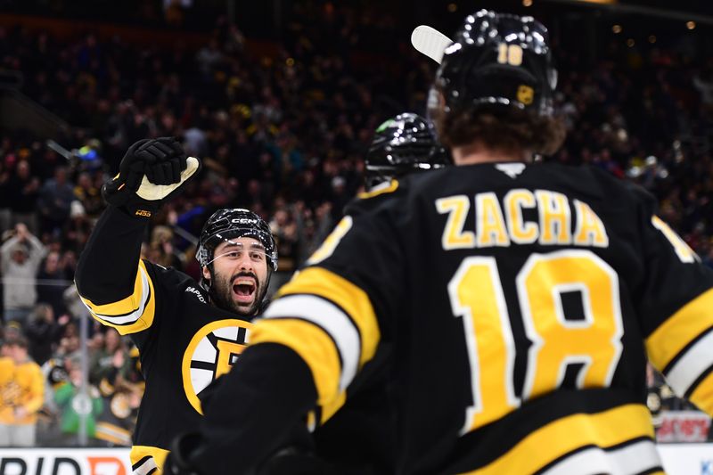 Jan 29, 2026; Boston, Massachusetts, USA; Boston Bruins defenseman Jonathan Aspirot (45) reacts after a goal by center Pavel Zacha (18) during the first period against the Philadelphia Flyers at TD Garden. Mandatory Credit: Bob DeChiara-Imagn Images