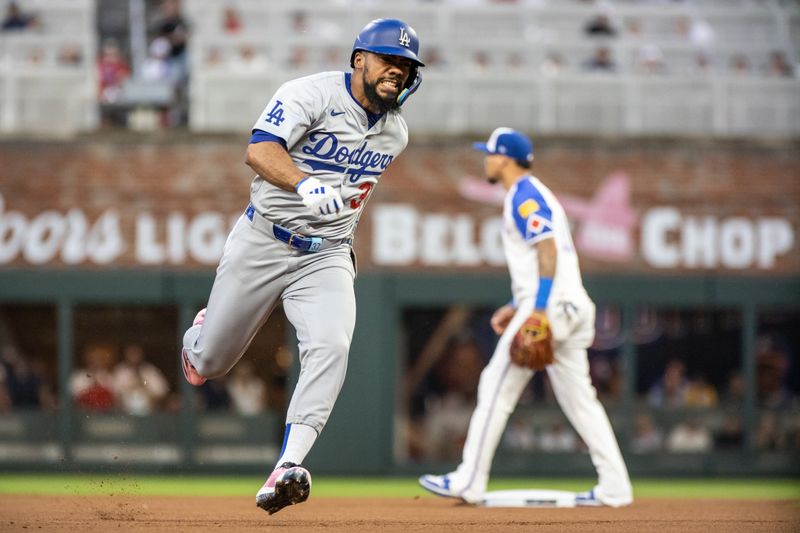 Sep 14, 2024; Cumberland, Georgia, USA; Los Angeles Dodgers outfielder Teoscar Hernández (37) runs the bases after making a hit against the Atlanta Braves during the first inning at Truist Park. Mandatory Credit: Jordan Godfree-Imagn Images