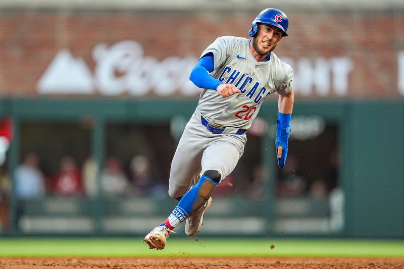 May 15, 2024; Cumberland, Georgia, USA; Chicago Cubs second baseman Miles Mastrobuoni (20) runs the bases against the Atlanta Braves during the third inning at Truist Park. Mandatory Credit: Dale Zanine-USA TODAY Sports