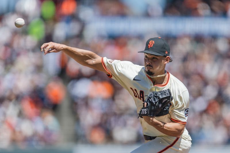 Apr 21, 2024; San Francisco, California, USA;  San Francisco Giants starting pitcher Jordan Hicks (12) throws against the Arizona Diamondbacks during the third inning at Oracle Park. Mandatory Credit: John Hefti-USA TODAY Sports