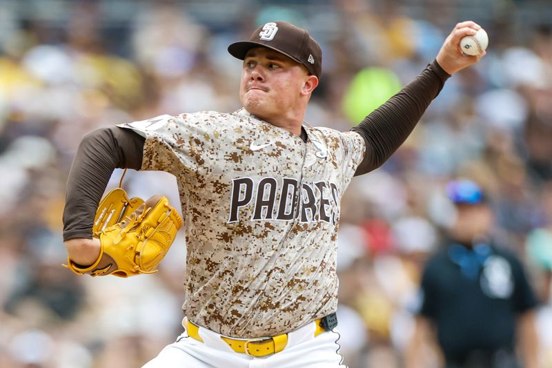 Jun 1, 2025; San Diego, California, USA; San Diego Padres relief pitcher Adrian Morejon (50) throws a pitch during the seventh inning against the Pittsburgh Pirates at Petco Park. Mandatory Credit: David Frerker-Imagn Images