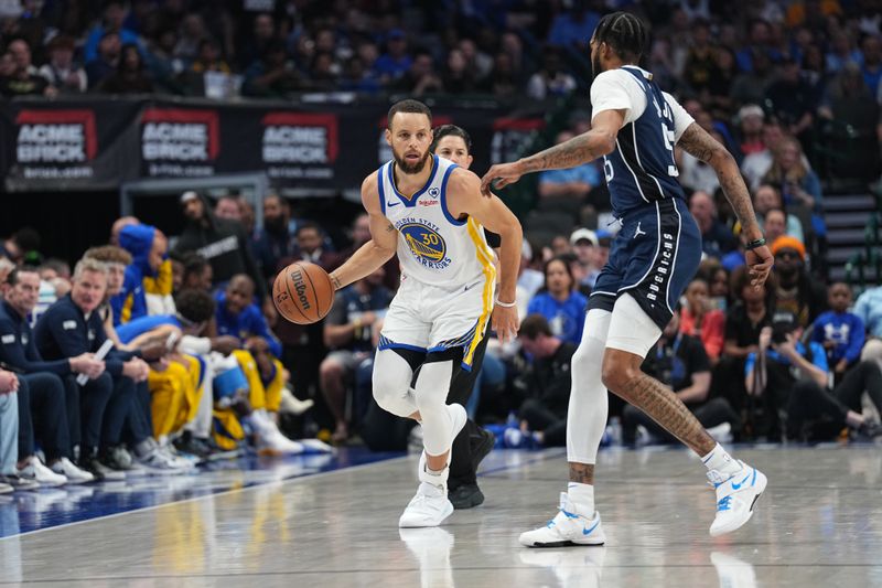 DALLAS, TX - APRIL 5: Stephen Curry #30 of the Golden State Warriors handles the ball during the game against the Dallas Mavericks on April 5, 2024 at the American Airlines Center in Dallas, Texas. NOTE TO USER: User expressly acknowledges and agrees that, by downloading and or using this photograph, User is consenting to the terms and conditions of the Getty Images License Agreement. Mandatory Copyright Notice: Copyright 2024 NBAE (Photo by Glenn James/NBAE via Getty Images)