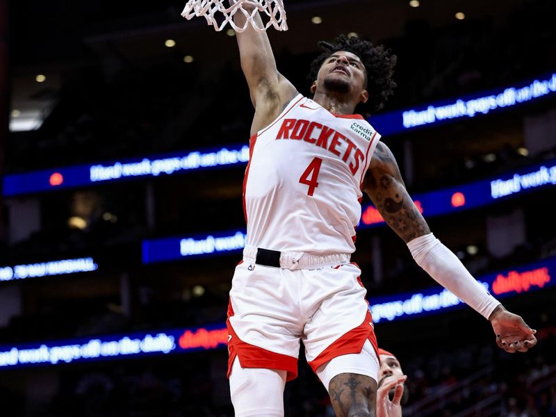 HOUSTON, TEXAS - JANUARY 31: Jalen Green #4 of the Houston Rockets dunks the ball against the New Orleans Pelicans during the first half at Toyota Center on January 31, 2024 in Houston, Texas. NOTE TO USER: User expressly acknowledges and agrees that, by downloading and or using this photograph, User is consenting to the terms and conditions of the Getty Images License Agreement.? (Photo by Carmen Mandato/Getty Images)