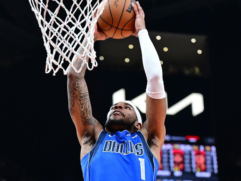 ATLANTA, GA - JANUARY 26: Jaden Hardy #1 of the Dallas Mavericks dunks the ball during the game against the Atlanta Hawks on January 26, 2024 at State Farm Arena in Atlanta, Georgia.  NOTE TO USER: User expressly acknowledges and agrees that, by downloading and/or using this Photograph, user is consenting to the terms and conditions of the Getty Images License Agreement. Mandatory Copyright Notice: Copyright 2024 NBAE (Photo by Adam Hagy/NBAE via Getty Images)