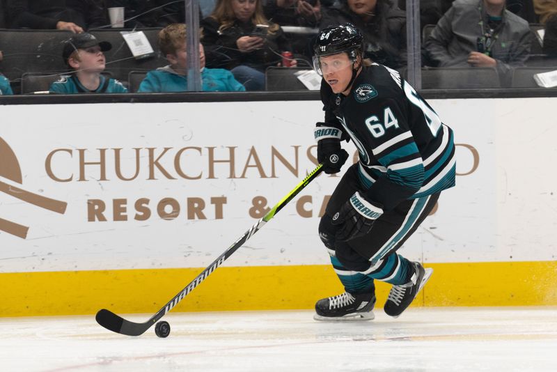 Feb 29, 2024; San Jose, California, USA; San Jose Sharks center Mikael Granlund (64) controls the puck during the first period against the Anaheim Ducks at SAP Center at San Jose. Mandatory Credit: Stan Szeto-USA TODAY Sports