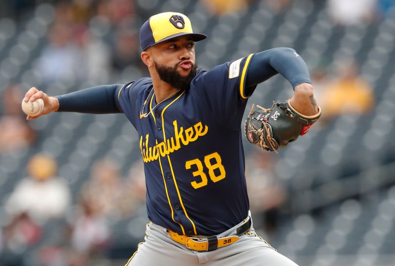 Sep 26, 2024; Pittsburgh, Pennsylvania, USA;  Milwaukee Brewers relief pitcher Devin Williams (38) pitches against the Pittsburgh Pirates during the ninth inning at PNC Park. The Brewers won 5-2. Mandatory Credit: Charles LeClaire-Imagn Images