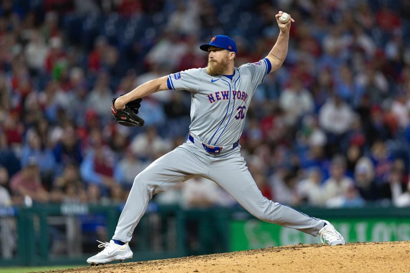 May 16, 2024; Philadelphia, Pennsylvania, USA; New York Mets pitcher Jake Diekman (30) throws a pitch during the eleventh inning against the Philadelphia Phillies at Citizens Bank Park. Mandatory Credit: Bill Streicher-USA TODAY Sports