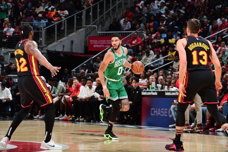 ATLANTA, GA - MARCH 28: Jayson Tatum #0 of the Boston Celtics dribbles the ball during the game against the Atlanta Hawks on March 28, 2024 at State Farm Arena in Atlanta, Georgia.  NOTE TO USER: User expressly acknowledges and agrees that, by downloading and/or using this Photograph, user is consenting to the terms and conditions of the Getty Images License Agreement. Mandatory Copyright Notice: Copyright 2024 NBAE (Photo by Scott Cunningham/NBAE via Getty Images)