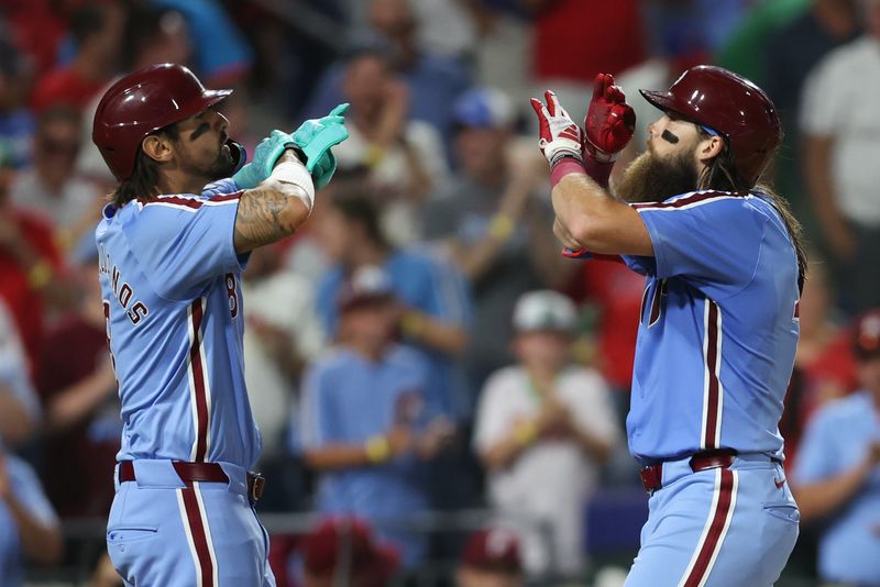 Aug 29, 2024; Philadelphia, Pennsylvania, USA; Philadelphia Phillies outfielder Brandon Marsh (16) celebrates with outfielder Nick Castellanos (8) after hitting a three RBI home run during the sixth inning against the Atlanta Braves at Citizens Bank Park. Mandatory Credit: Bill Streicher-USA TODAY Sports