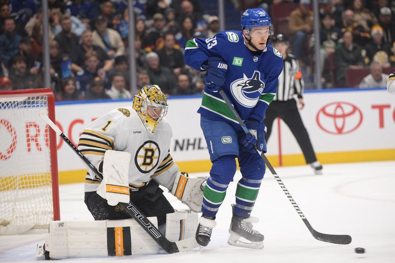 Feb 24, 2024; Vancouver, British Columbia, CAN;  Vancouver Canucks forward Elias Lindholm (23) screens Boston Bruins goaltender Jeremy Swayman (1) during the first period at Rogers Arena. Mandatory Credit: Anne-Marie Sorvin-USA TODAY Sports